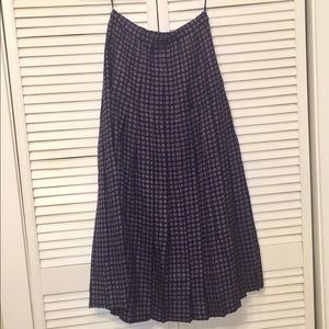 Patterned silk high waisted pleated midi skirt